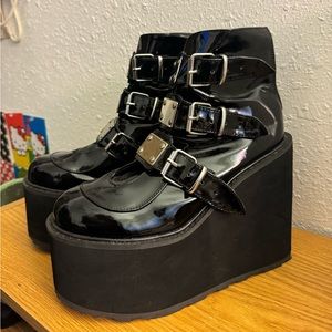 Demonia SWING 105 Dark Resistance Patent Black Platform Boots